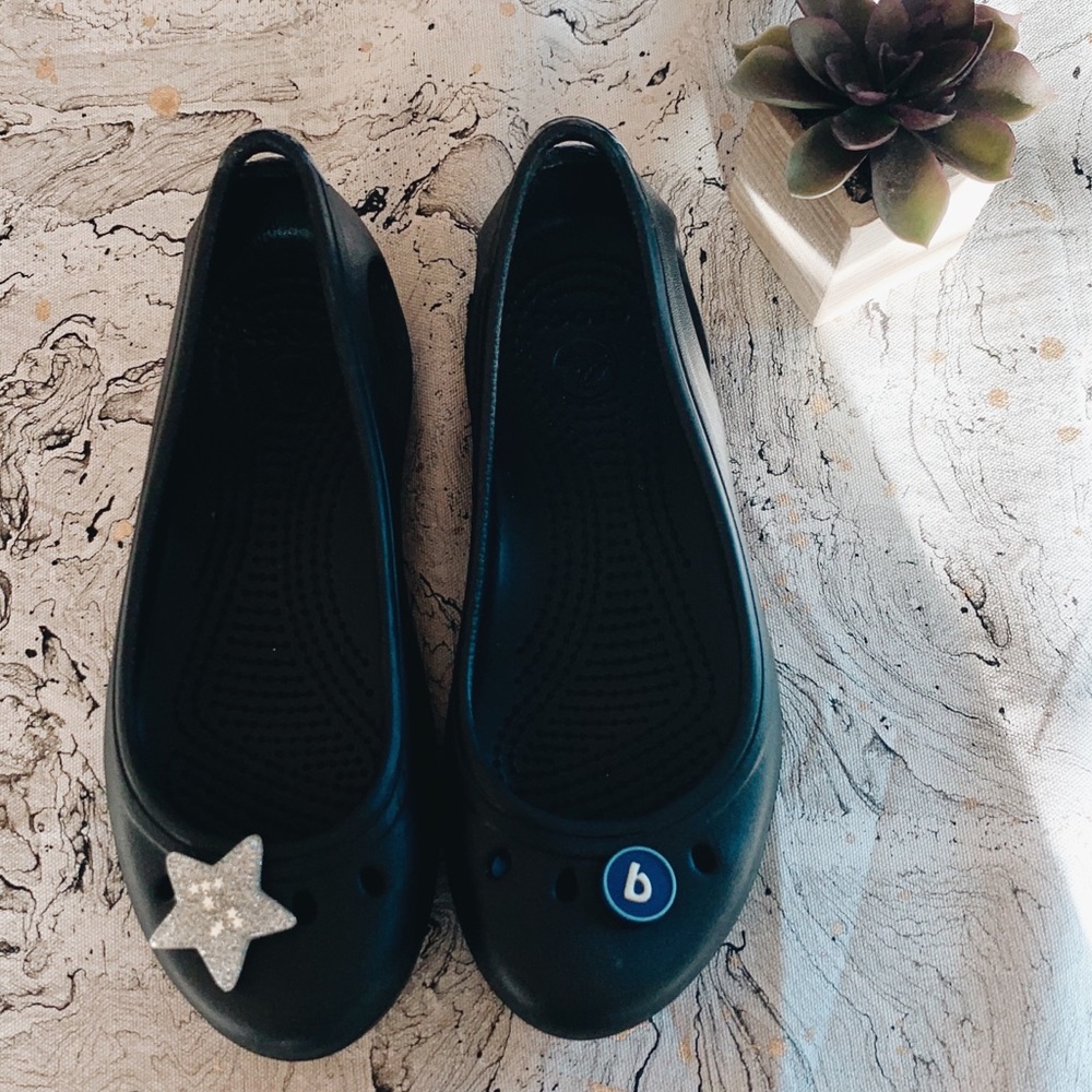 worn twice black crocs with jibbits included